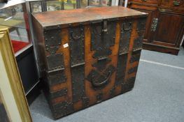 An Eastern metal bound pine storage cabinet.
