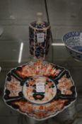A Japanese imari hexagonal shaped bottle together with a similar dish.