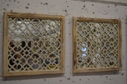 A pair of square lattice work mirrors.