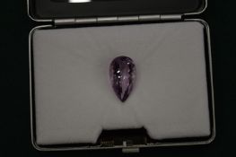 A pear shaped amethyst with certificate.