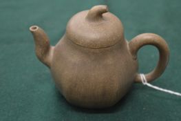 A Chinese melon form Yxing teapot.