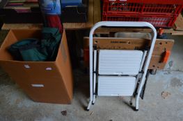 A step ladder, Workmate and other items.