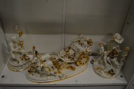 Decorative porcelain group of coach and horses and similar items.