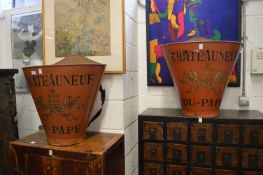 A pair of grape picking buckets.