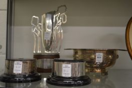 Various plated trophy items.