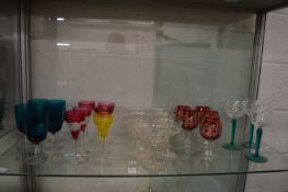 Coloured and other drinking glasses.