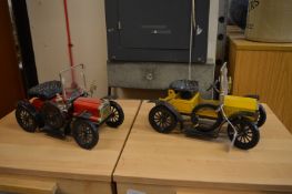 Two model vintage cars.