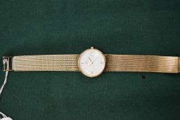 A gentlemans Omega 9ct gold wristwatch with mesh strap.