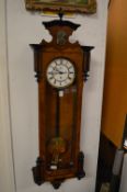 A Vienna style walnut cased wall regulator.