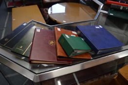 Six albums containing numerous stamps and first day covers.