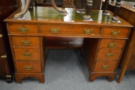 A Victorian walnut pedestal desk.