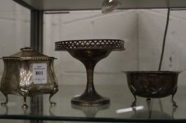 A silver tea caddy and two other items.