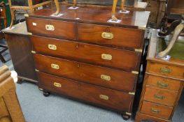 A good military style mahogany chest of drawers.
