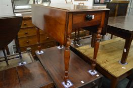 A Victorian mahogany Pembroke table.