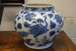 A good large Chinese blue and white jar decorated with birds.