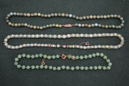 Jade and other bead necklaces.