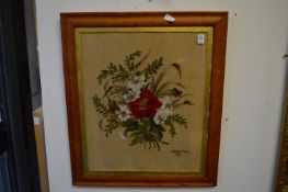 Four early 20th century maple framed floral embroideries.