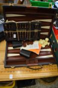 Three boxwood rulers, two abacuses and backgammon set.