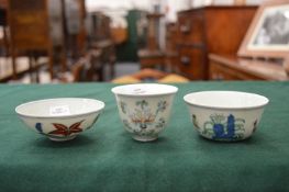 Three small Chinese Doucai style bowls.