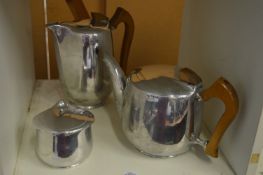 A Picquot Ware three piece aluminium service.