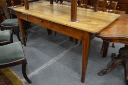 A 19th century French elm farmhouse table.