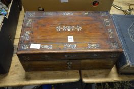 A Victorian mother of pearl inlaid rosewood writing slope.