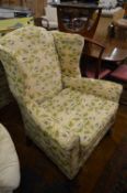 A pair of Georgian design wing armchairs.