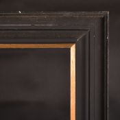 An ebonized moulded frame, rebate size 29