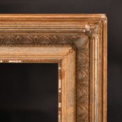 A 19th Century gilt composition frame with anthemion decoration, 19.75
