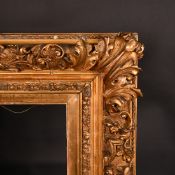 A 19th Century Continental gilt composition frame, rebate size 18.5