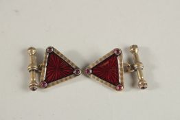 A PAIR OF RUSSIAN SILVER AND RED ENAMEL TRIANGULAR CUFFLINKS. Weight 14grms.