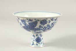 A CHINESE BLUE AND WHITE STEM CUP with six character mark. 16cms diameter.