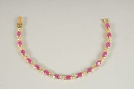 A SILVER RUBY LINE BRACELET.