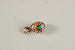 A 14CT GOLD STRIPED ENAMEL EGG PENDANT.