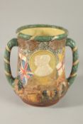 A LAFRGE ROYAL DOULTON LOVING CUP to celebrate the SILVER JUBILEE of his Majesty King George V and