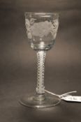 A GOOD CONTINENTAL GLASS DECANTER. engraved CR in a shell, with silver mount and stopper. 28cms