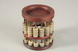 A WOODEN JADE ABACUS.