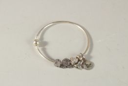 A PANDORA SILVER BANGLE BRACELET.