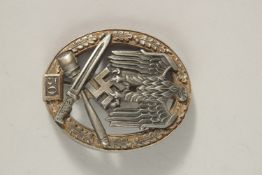 A GERMAN WWII 50 COMBAT BADGE.