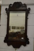 A GEORGE III DESIGN MAHOGANY FRETWORK FRAMED MIRROR.