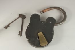A LARGE IRON PADLOCK AND KEY.
