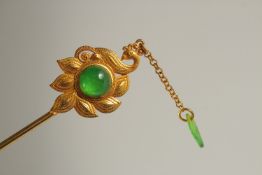 A CHINESE JADE HAIR PIN.