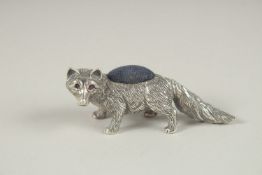 A SILVER PIN CUSHION 