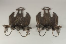 A GOOD PAIR OF BRONZE BAT TWO LIGHT WALL SCONCES. 32cms high.