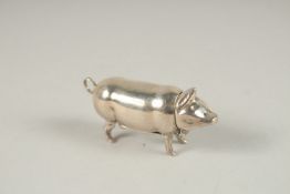 A SMALL SILVER PIG VESTA. 5cms.