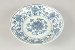 A CHINESE BLUE AND WHITE PORCELAIN LOTUS DISH. 22cms diameter.