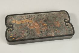 A CHINESE INK STONE. 22cms x 10cms.