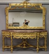 A LARGE LOUIS XVITH DESIGN GILDED CONSOLE TABLE WITH MARBLE TOP AND MIRROR with ribbon motifs and