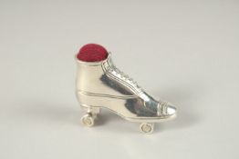 A SILVER PIN CUSHION 