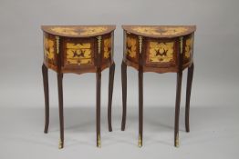 A PAIR OF LOUIS XVITH DESIGN INLAID HALF MOON BEDSIDE TABLES with three drawers, on curving legs.